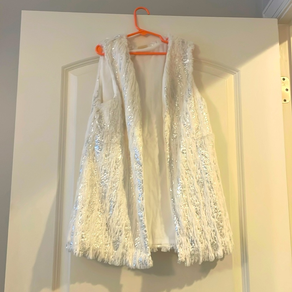 M. L. Kids! Size 10 white with silver! Worn five or six times! In good condition